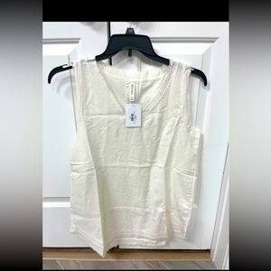 NWT off white linen sleeveless top with cute detail edges around neckline.